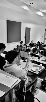  Participants learning how to use iPads as accessibility tools 